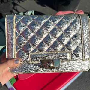 Gold chain quilted bag